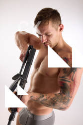 Man Adult Muscular White Fighting with rifle Standing poses Underwear