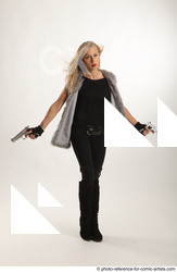 Woman Adult Athletic White Standing poses Casual Fighting with gun