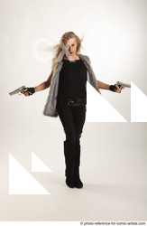 Woman Adult Athletic White Standing poses Casual Fighting with gun