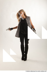 Woman Adult Athletic White Standing poses Casual Fighting with gun