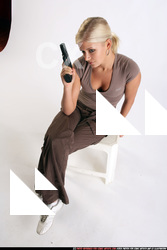 Iva decision female pistol sitting