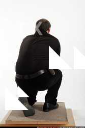 Matej-kneeling-shooting-hk