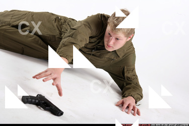 Janisone picking up pistol