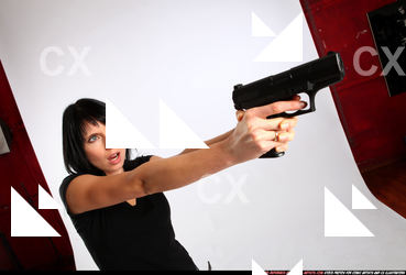 silvia-standing-aiming-pistol