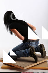 silvia-kneeling-wounded