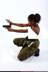 jenna-soldier-kneeling-pistols