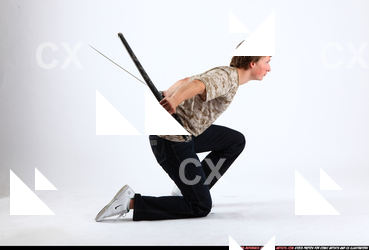 patrick-kneeling-dual-katana