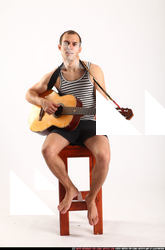 frankie-sitting-playing-guitar