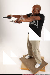 Gael Casaus-standing-dual-pistols2