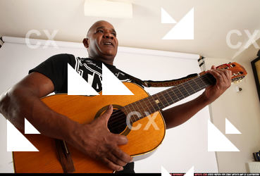 Gael Casaus-standing-playing-guitar