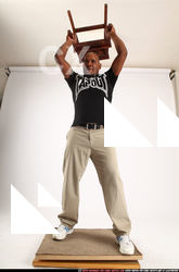 Gael Casaus-standing-throwin-object