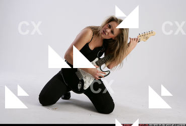 BETHANY_ROBERTS-PLAYING-GUITAR
