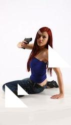 nina-sitting-pistol-pose2