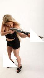 kayaa-standing-aiming-shotgun