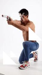 mack-kneeling-aiming-pistol