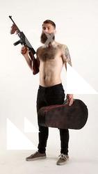 oscar-tommygun-case-pose