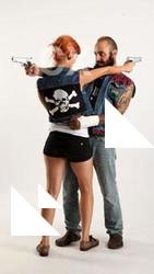 Edgar-pistols-pose4-cross-shooting