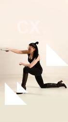 claudia-kneeling-aiming-pistol