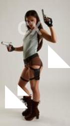 SHRIMA POSES WITH GUNS