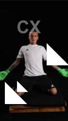 Claudio KNEELING SOCCERPLAYER