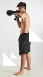 Standing man with box gloves Yoshinaga Kuri