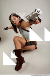 Shrima Kneeling Pose With Guns