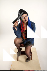 Dolores Sitting Pistol Pose