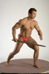 Man Adult Muscular White Fighting with knife Standing poses Underwear