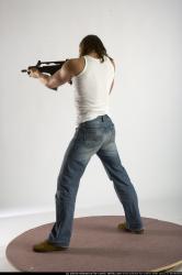 Man Young Muscular White Fighting with submachine gun Standing poses Casual