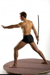 Man Adult Athletic White Fighting with sword Standing poses Underwear