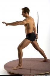 Man Adult Athletic White Fighting with sword Standing poses Underwear