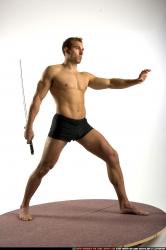 Man Adult Athletic White Fighting with sword Standing poses Underwear