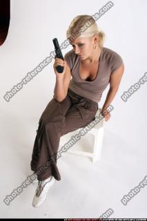 Iva decision female pistol sitting