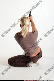 kneeling-leaning-aiming-female