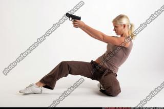 kneeling-leaning-aiming-female