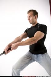 Man Adult Muscular White Fighting with sword Standing poses Sportswear