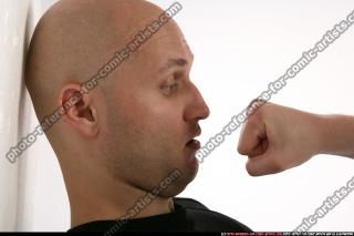 FIST IN FRONT OF FACE 01