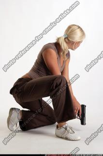 mercenarygirl-covering-pistol