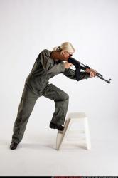 Woman Adult Athletic White Fighting with submachine gun Standing poses Army