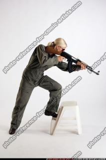 army-Iva-standing-on-chair