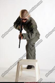 army-Iva-standing-on-chair