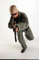 Woman Adult Athletic White Fighting with submachine gun Crouching Army