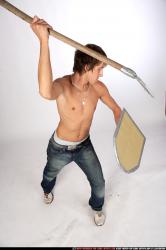 Man Young Muscular White Fighting with spear Standing poses Pants