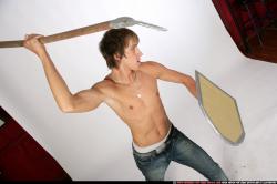 Man Young Muscular White Fighting with spear Standing poses Pants