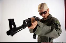 Woman Young Athletic White Fighting with submachine gun Detailed photos Army