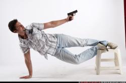 Man Adult Average White Fighting with gun Moving poses Casual