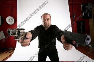 Matej-shooting-dual-pistols