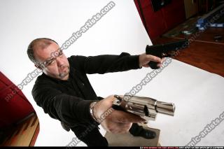 gangster-shooting-dual-pistols