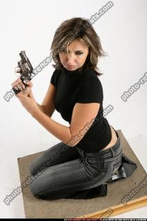 woman-sitting-revolver