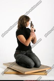 woman-sitting-revolver